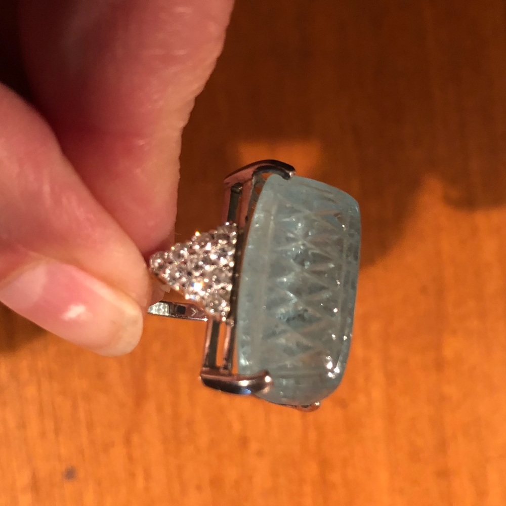 Carved huge aquamarine and diamond solid gold ring.